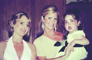 Bride Staci Hassman, left, spends a moment with Raegan Lombardi, right, and Raegen's mom Layne Taylor, center, at her wedding this past weekend