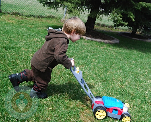 My youngest pushing the FP bubble mower