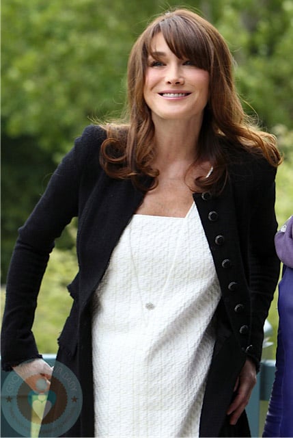 An expectant Carla Bruni-Sarkozy at G8 Summit in France