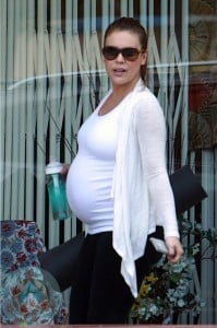 A pregnant Alyssa Milano leaving Yoga