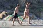 A pregnant Carla Bruni and husband Nicolas Sarkozy on Fort de Brégançon beach