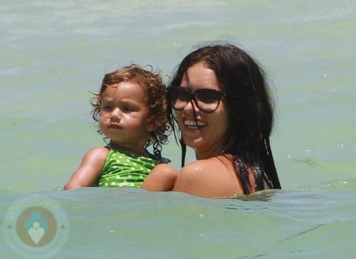 Adriana Lima with her daughter Valentina at the beach in Miami