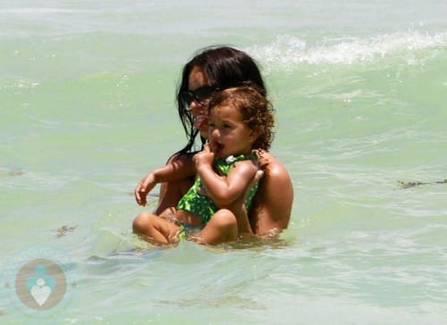 Adriana Lima with her daughter Valentina at the beach in Miami