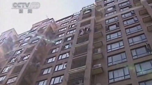 The apartment building the toddler fell from