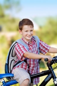 boy biking to school