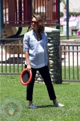 A pregnant Jessica Alba at the park
