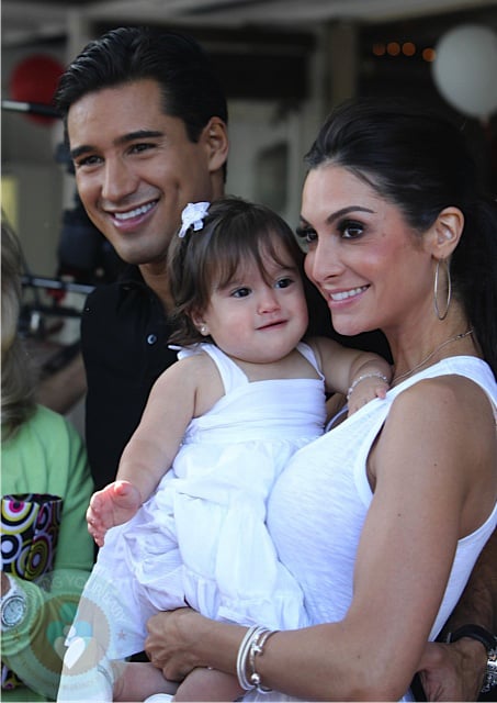 Mario Lopez and girlfriend Courtney Mazza with their daughter Gia