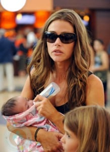 Denise Richards feeding Eloise at the Airport