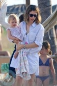 Sofia Coppola with daughters Cosmina and Romy (blue bikini)