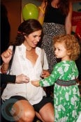 A pregnant Ana Ortiz with daughter Paloma