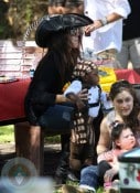 Sandra Bullock and Louis dressed as Pirates for a party