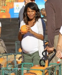 A very pregnant Nia Long at Mr