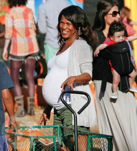 A very pregnant Nia Long at Mr