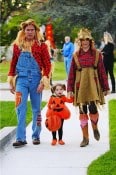Alyson Hannigan, Alexis Densiof and daughter Satyana go trick or treating