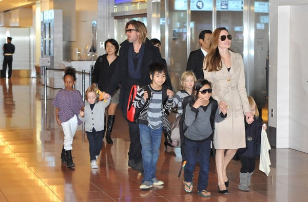 Brad Pitt and Angelia land in Tokyo with their 6 kids
