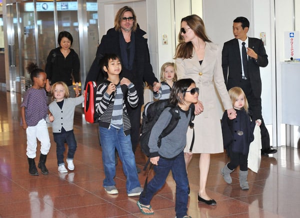 Brad Pitt and Angelia land in Tokyo with their 6 kids