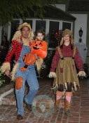 Alyson Hannigan, Alexis Densiof and daughter Satyana go trick or treating