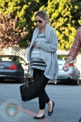 Pregnant Rebecca Gayheart grocery shopping with her husband