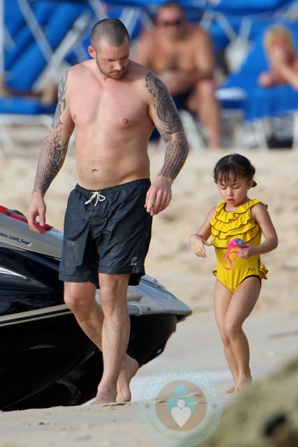 Graham and Ava Quinn at the beach in Barbados