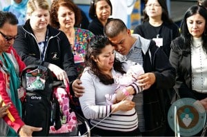 Melinda Star Guido with her parents while leaving the hospital