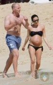 Pregnant Andrea Corr and husband Brett Desmond on vacation in Barbados