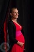 Pregnant Molly SIms on the red carpet