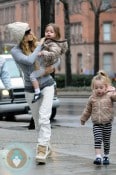 Sarah Jessica Parker carries daughter Marion to school