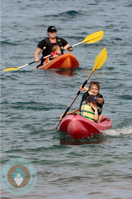 Sheryl Crow boats with sons Wyatt and Levi in Hawaii