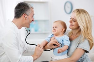 Pediatrician checking baby patient