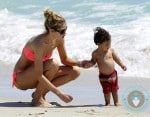 Doutzen Kroes and son Phyllon James at the beach
