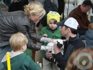 Julie Bowen with twins John and Gus Phillips at the petting zoo