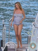 Pregnant Uma Thurman on a yacht in ST