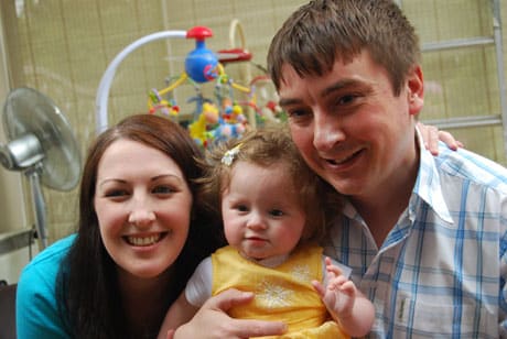 Anna Reid with her parents