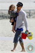Joel and Sparrow Madden at the beach