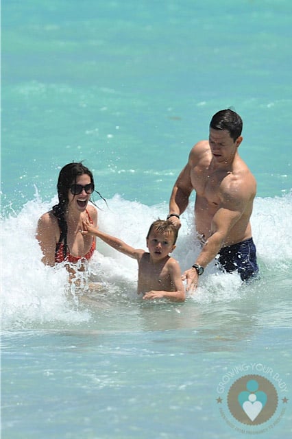 Mark and Michael Wahlberg, Rhea Durham at beach Miami