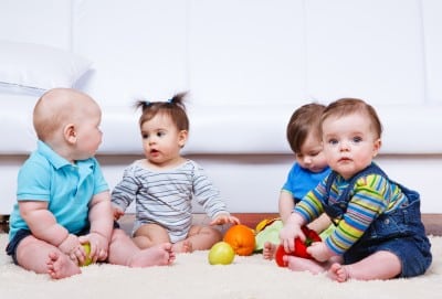Babies sitting floor