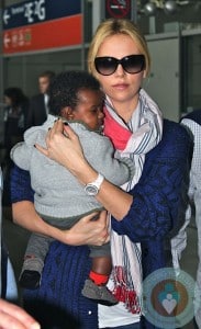 Charlize Theron with son Jackson @ Charles De Gaulle Airport
