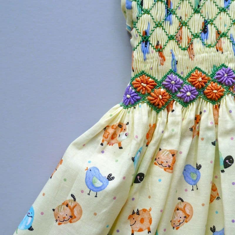 baby frock smocking designs