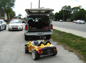 Grandparents Paul and Belinda Berloni Arrested For Towing granddaughter behind SUV in toy car 2