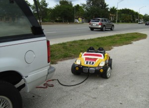 Grandparents Paul and Belinda Berloni Arrested For Towing granddaughter behind SUV in toy car 3