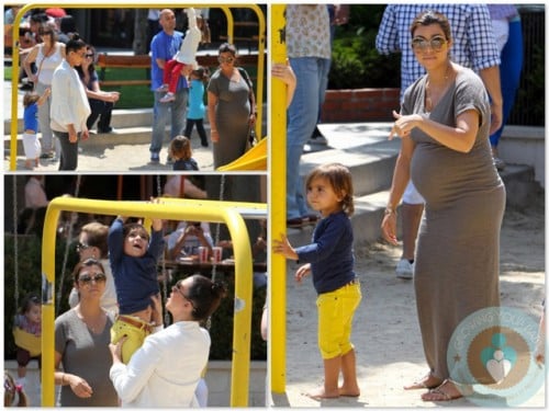 Kourtney and Kim Kardashian at the park with Mason Disick