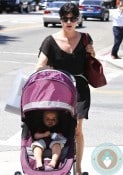 Selma Blair, Arthur Bleick stroll in LA baby jogger