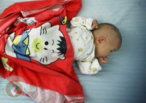 baby girl with 3 legs abandoned in China