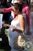 pregnant Kourtney Kardashian shopping at Bel Bambini