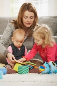 Mom and children playing