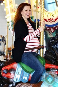 pregnant-Alyson-Hannigan-on-the-carousel-at-Santa-Monica-Pier