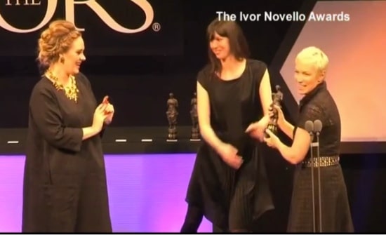 Pregnant ADELE accepts an award at Ivor Novello Awards