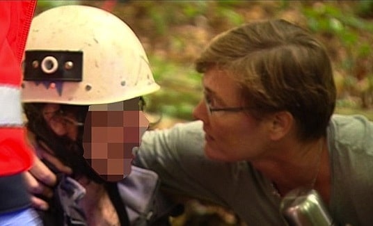 Ina Koenig (left) is pulled from a mine shaft by rescue workers