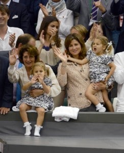 Mirka Federer watches husband Roger Federer with her twin daughters Myla Rose and Charlene Riva