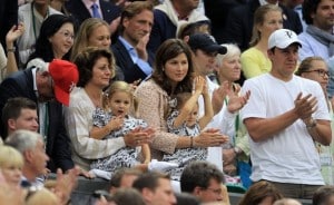 Mirka Federer watches husband Roger Federer with her twin daughters Myla Rose & Charlene Riva